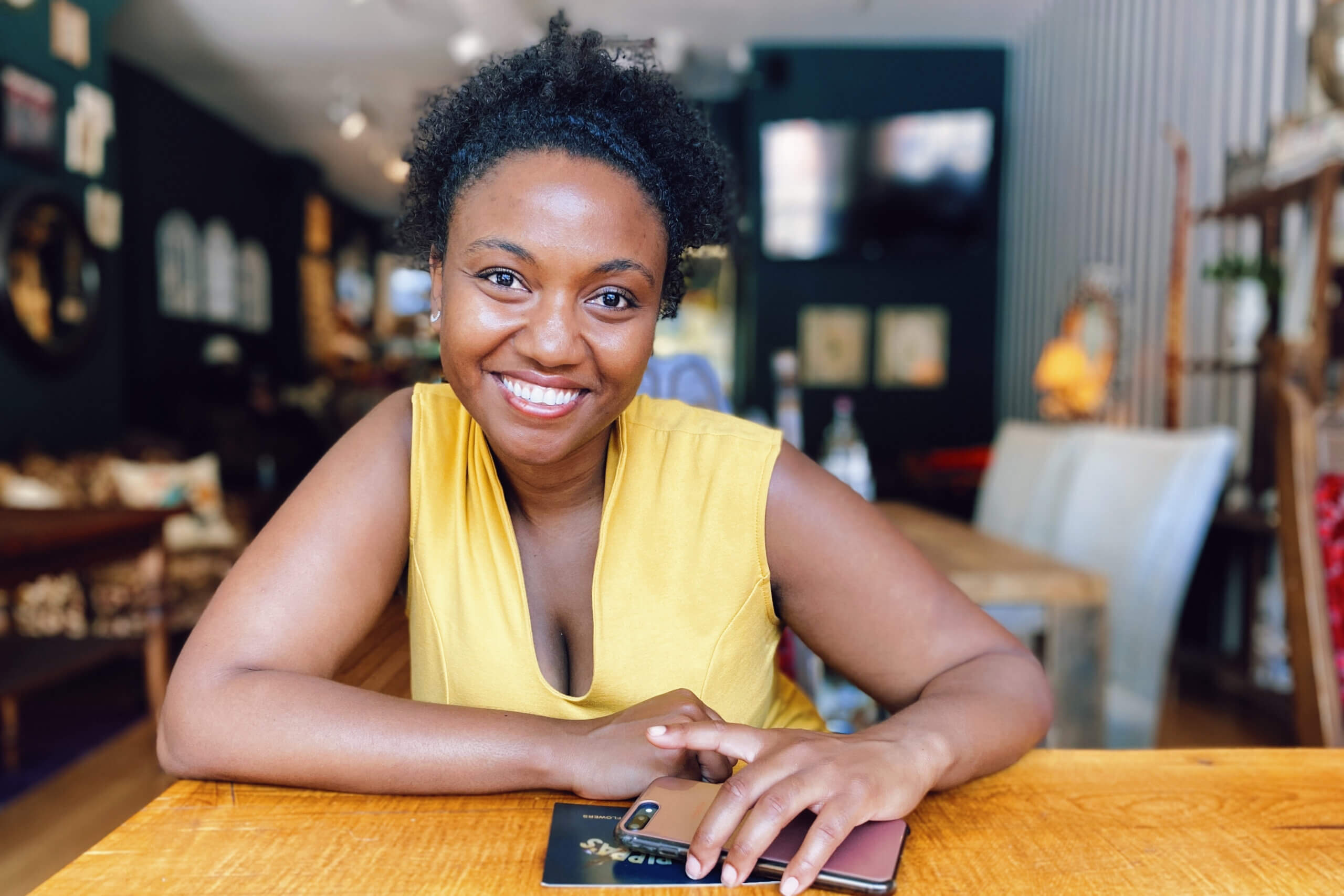 Headshot of Jette Stubbs, smiling, sitting in an office