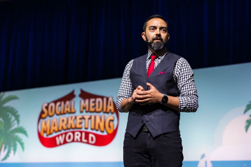 Pat onstage speaking at Social Media Marketing World