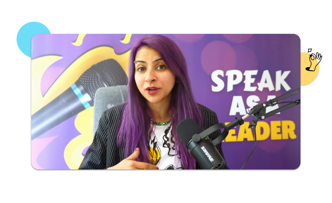 Nausheen I. Chen seated in front of a mic with "Speak as a Leader" written on the wall in the background.